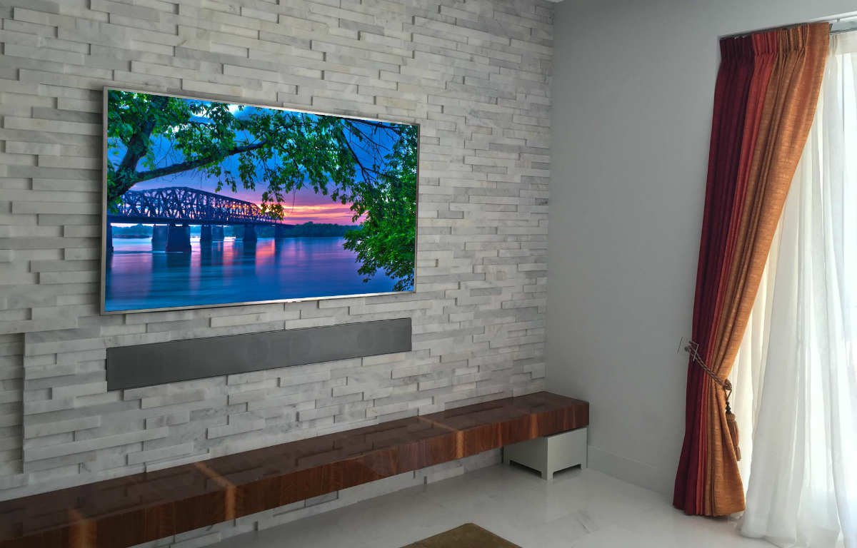 Custom-made James Loudspeaker Soundbar ‘Rocks’ in Large Stone Wall Project