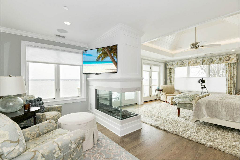 Challenging Master Bedroom Project Features Two Back-to-Back Over the Fireplace Displays, slide 1
