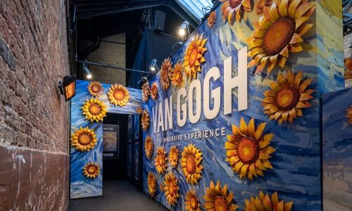 Outside a Van Gogh installation symbolizing immersive experiences enabled by spatial audio and immersive sound design.