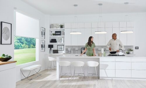 Interior shot of a kitchen featuring the Vantage LHUMAN human centric lighting system alongside Legrand Shading System solutions to highlight the company offerings for Lightapalooza 2023.