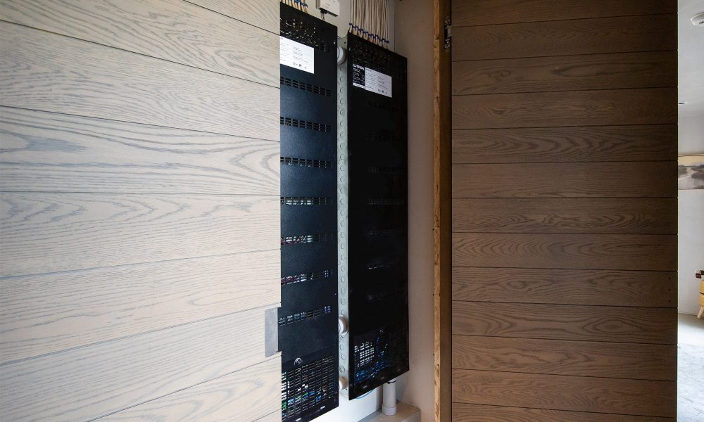 System 7 Uses Motorized Shades with Dark Fabric to Preserve Privacy and Views in Rhode Island Home, slide 9