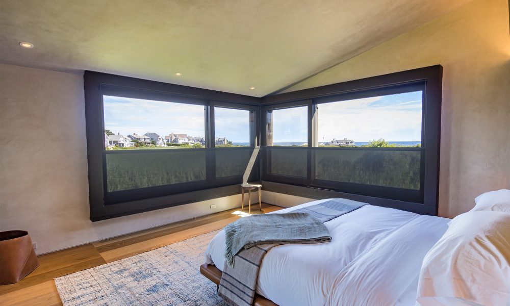 System 7 Uses Motorized Shades with Dark Fabric to Preserve Privacy and Views in Rhode Island Home, slide 3