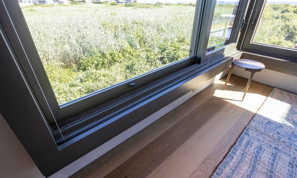 System 7 Uses Motorized Shades with Dark Fabric to Preserve Privacy and Views in Rhode Island Home, slide 4