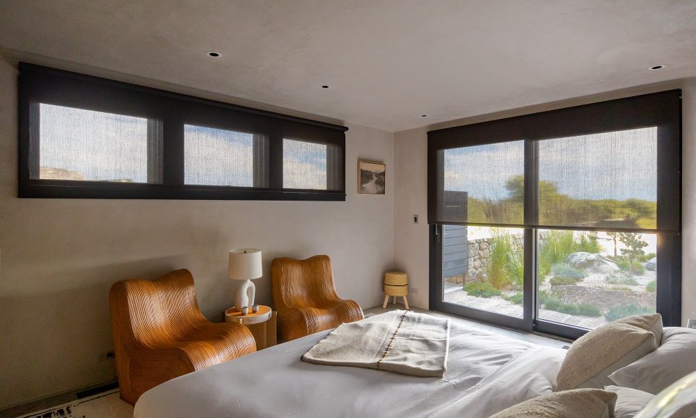 System 7 Uses Motorized Shades with Dark Fabric to Preserve Privacy and Views in Rhode Island Home, slide 1