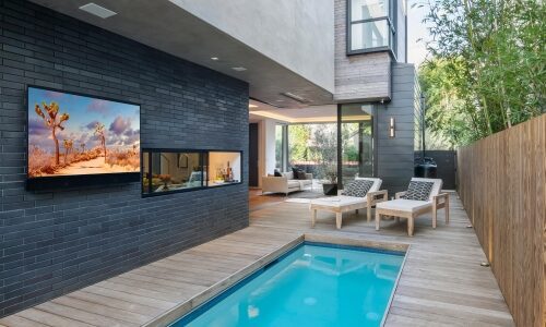 Scandifornian Modern swimming pool jacuzzi area with Arbor Wood flooring and Seura outdoor TV
