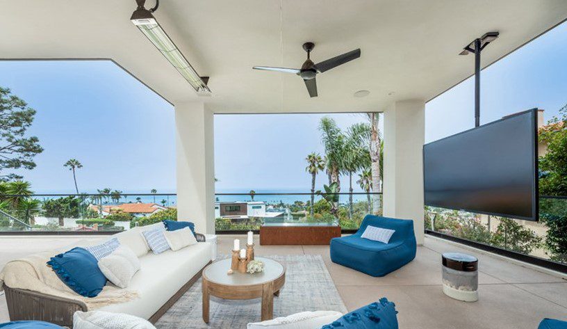 Exterior patio, outdoor coastal air, ceiling mounted TV and overhead heat lamp, coastal living.