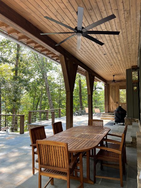 Porch/terrace looking out into pristine, fresh green forest along shoreline of Wilson Lake Killen Alabama