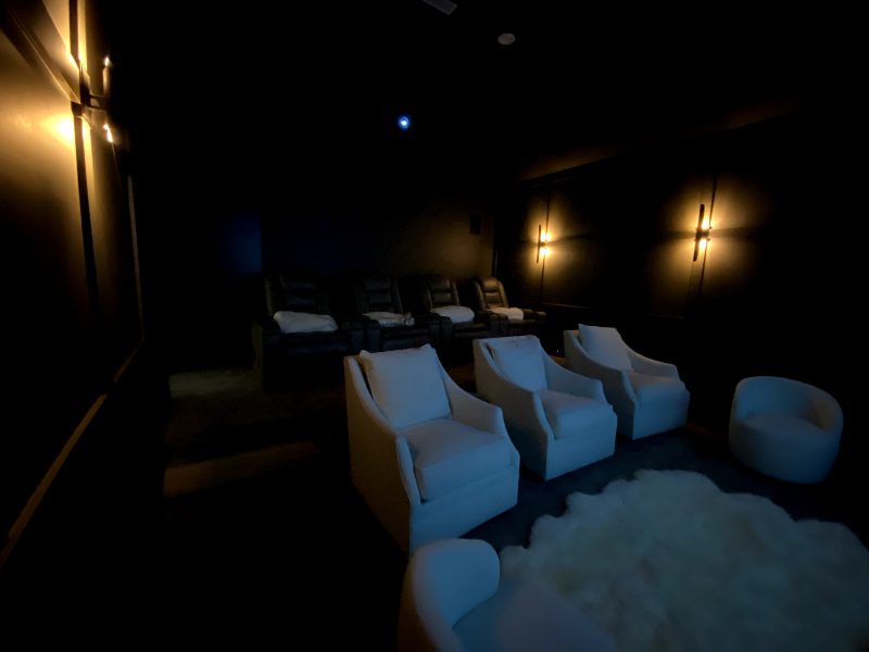 Dim room luxury smart home cinema theater seating Sony VPL-VW325ES 4K projector Bowers & Wilkins in wall in ceiling speakers audio system dolby atmos surround sound soundvision llc cornelius north carolina.