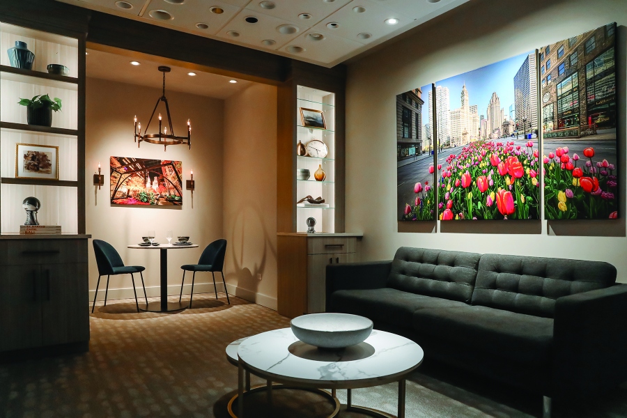 Interior home technology showroom with artful accents and lighting on the wall