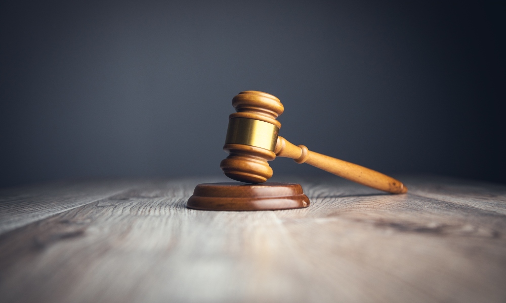 Gavel on table meant to symbolize judge blocking Trump's liberation day tariffs