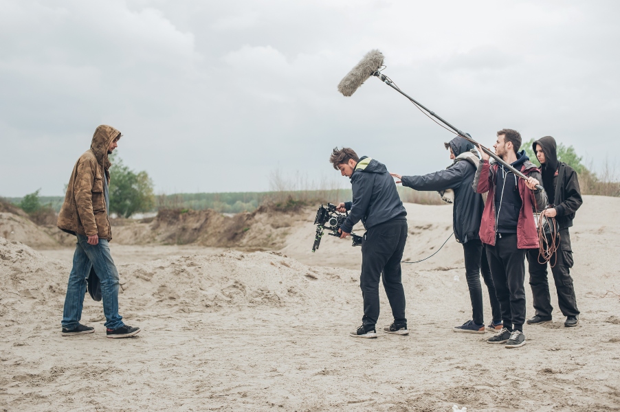 Behind the scenes image people filming streaming content