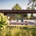 Side view of minimalist Japanese-inspired smart home architecture in Colorado with integrated technology