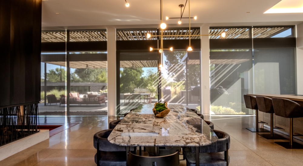 Dining area of Japanese-inspired smart home with Control4 lighting scenes and hidden audio integration