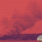 Wildfire behind house in California representing common natural disaster integrators should have a prepared response to