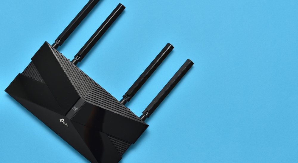 TP-Link router on blue background highlighting story being focused on in CE Pro's weekly Playback news recap of custom integration smart home AV stories