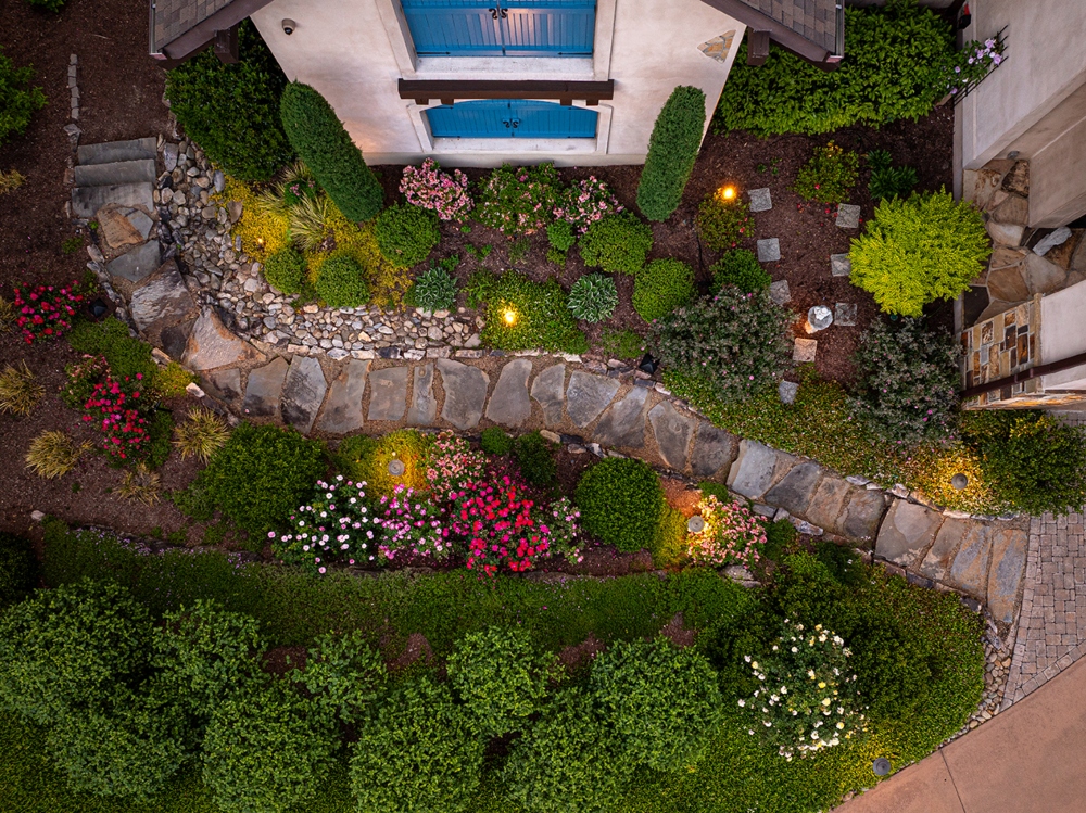 Illuminated stone walkway in Blue Ridge mountain home garden
