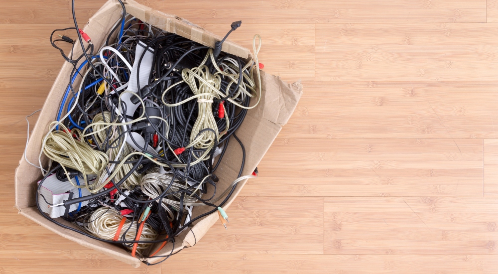 Box of cables meant to represent the abandoned HDMI 2.1 feature of Cable Power