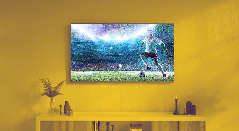 Image of a glitchy TV set among minimalist design, concept of how integration myths harm collaboration between integrators and designers