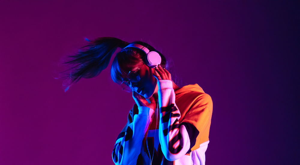 Woman listening to music vigorously meant to symbolize the health benefits of music