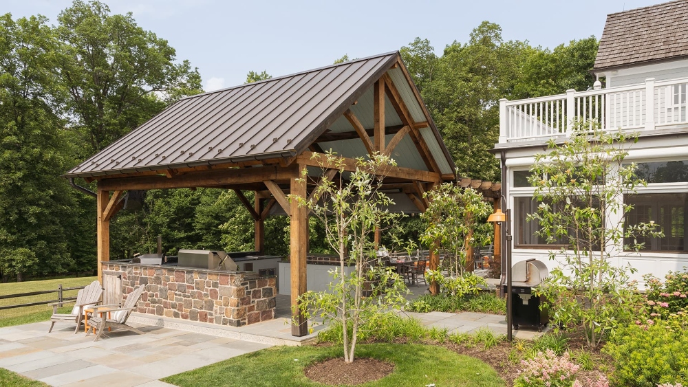 Full outdoor pavilion in Bucks County, Pennsylvania with multi-zone outdoor audio and integrated smart home systems, exemplifying architectural concealment and design-conscious outdoor technology.