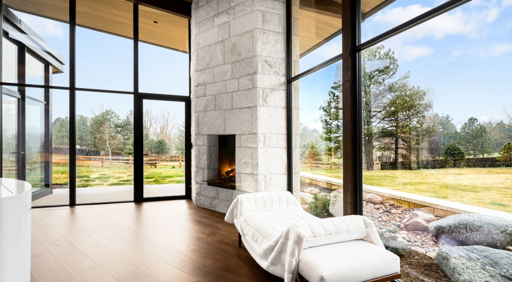 Cherry Hills master bedroom with design-first lighting and concealed AV integration by QAV.