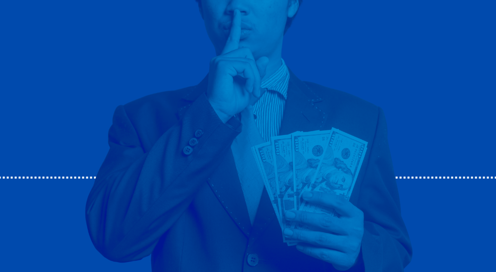 Man shushing audience with money meant to showcase the quiet talent shortage happening in CI sales that is leading to an uptick in salaries