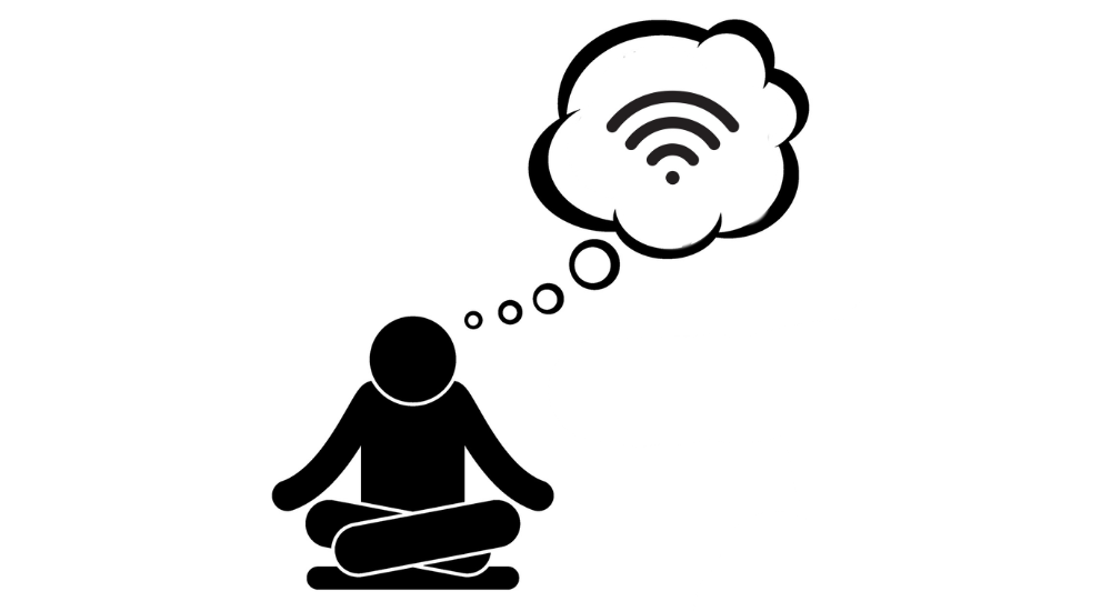 Man engaged in precognition remote viewing with a wi-fi symbol in view meant to represent a playful interpretation of how CIA remote viewing language mirrors best practices for wireless networking