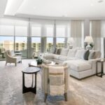 Luxury St. Regis Longboat Key penthouse living room with motorized Lutron dual shades and Gulf waterfront views