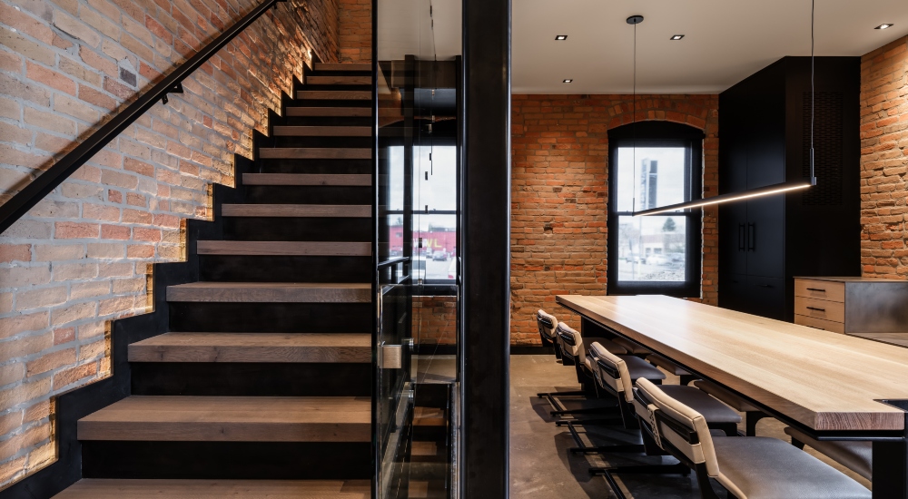 Original staircase in historic Gothic I-House with preserved architecture and integrated smart home lighting control