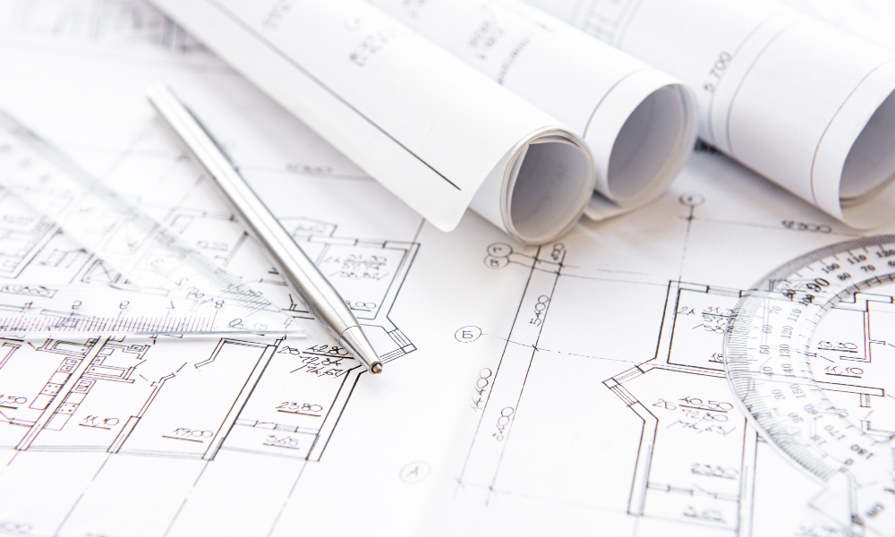 Architectural and building design plans highlighting the need for introducing low voltage earlier in the design process.